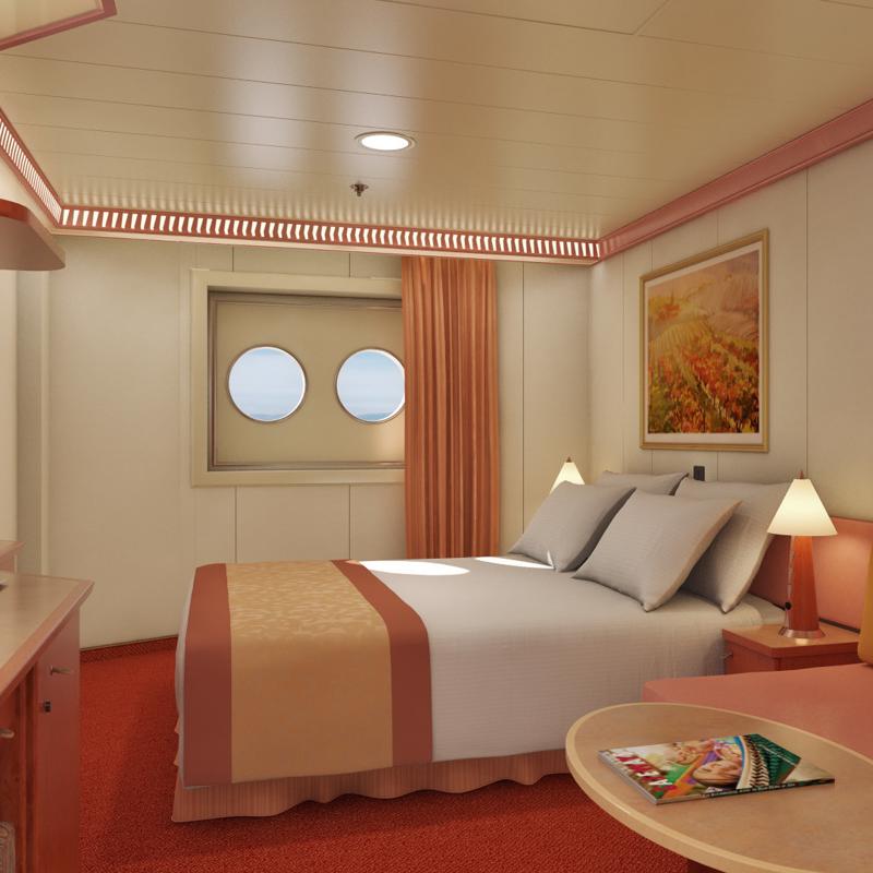 An outside cabin with portholes onboard Carnival Radiance